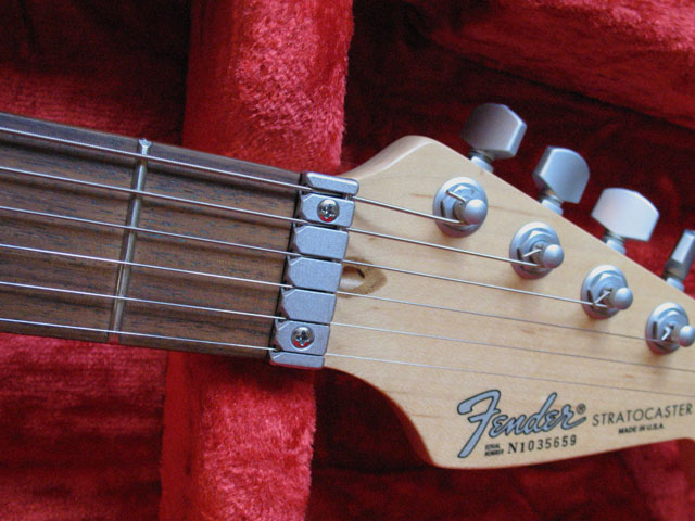 http://xhefriguitars.com/Parts/WilkinsonNutClose.jpg