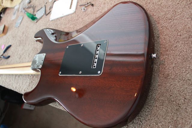 http://xhefriguitars.com/Stuff/FlameCustomBuild2011/Build%201%20Finish/ULTRA%20FINISHED2.jpg